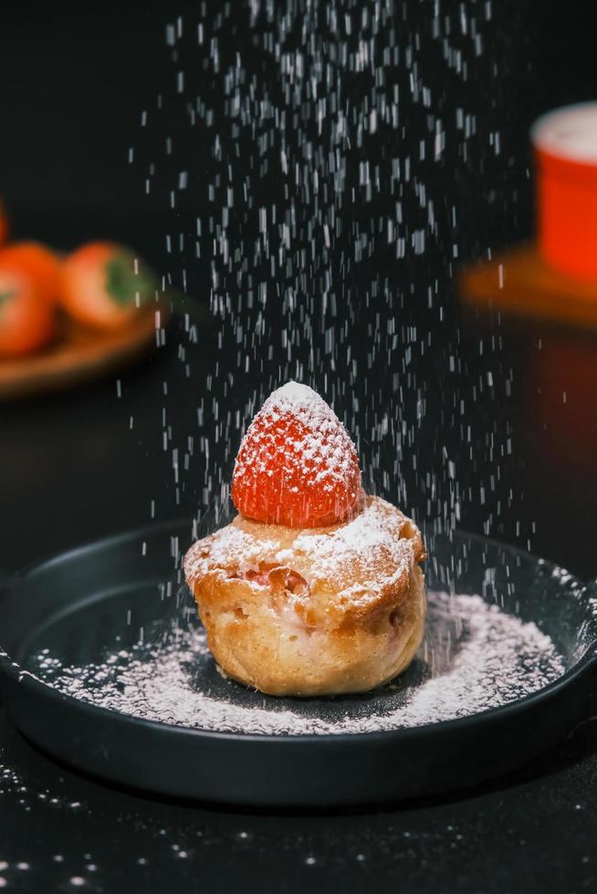 Homemade Strawberry cake topping with icing sugar. Sweet food. Sweet dessert. perfect summer season dessert served on plate. Stock Free