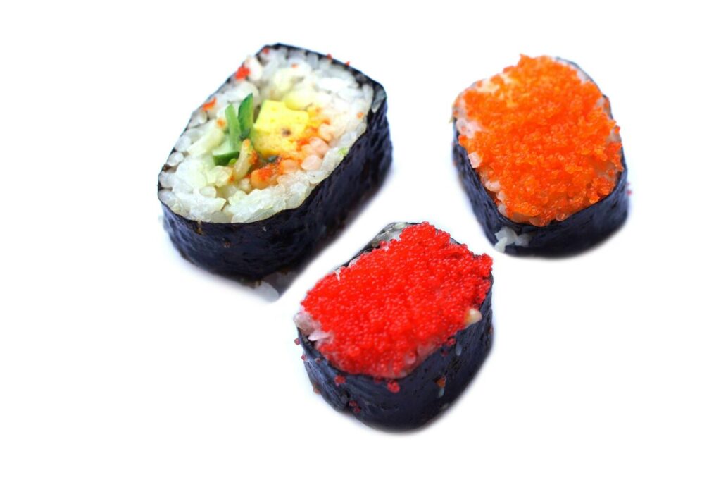 Homemade sushi, rice wrapped with seaweed, colorful topping. Concept, Traditional Japanese food. Cuisine, culture eating lifestyle. Favorite street food in Thailand. Stock Free