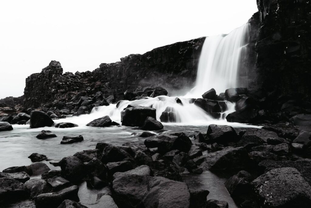 Icelandic Öxarárfoss Waterfall with Black Rocks Free Photo