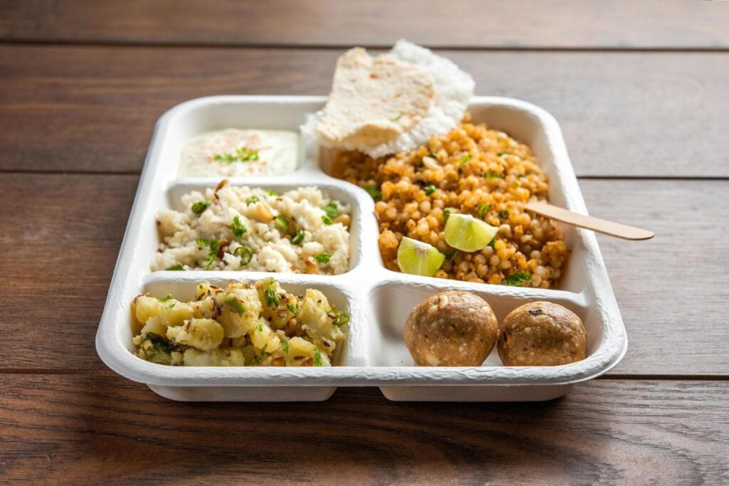 Indian Upwas thali, fasting food platter or thali for home delivery or takeaway parcel for any Vrat Stock Free