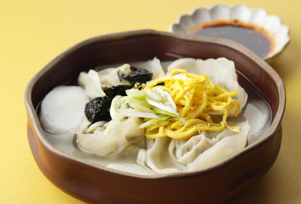 Korean traditional food Sliced Rice Cake Soup ,Tteok and dumpling soup Stock Free