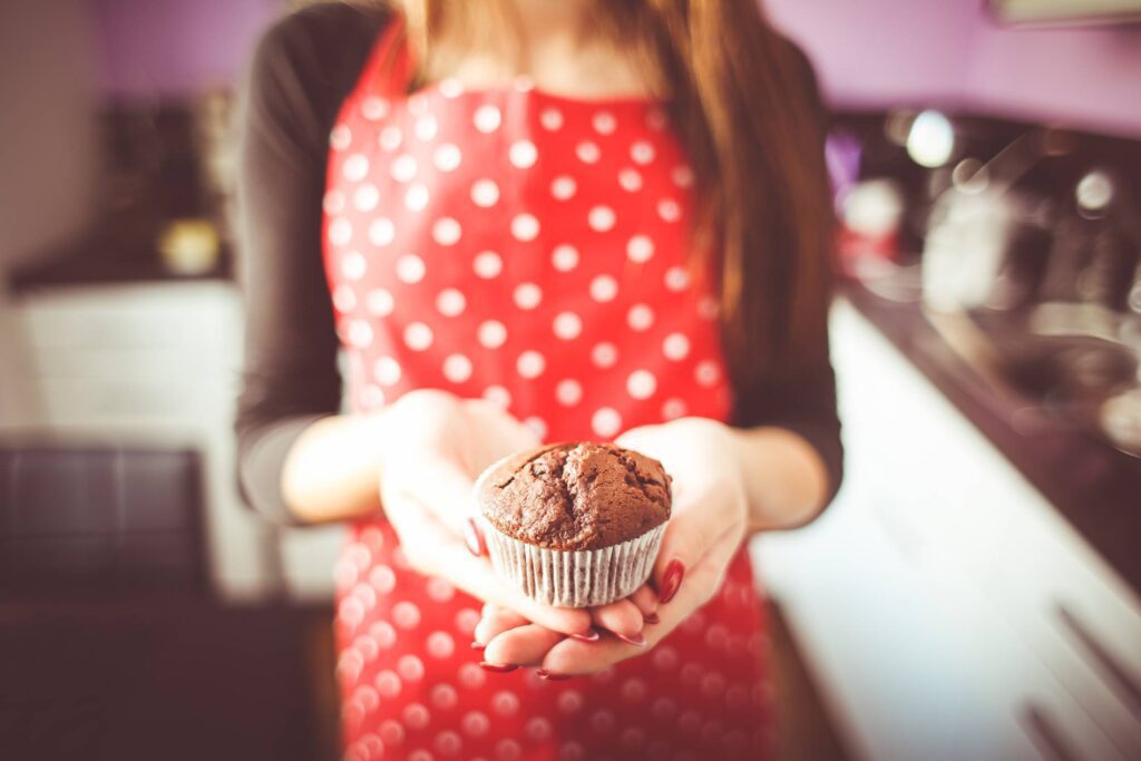 Little Homemade Muffin in Hands Free Photo