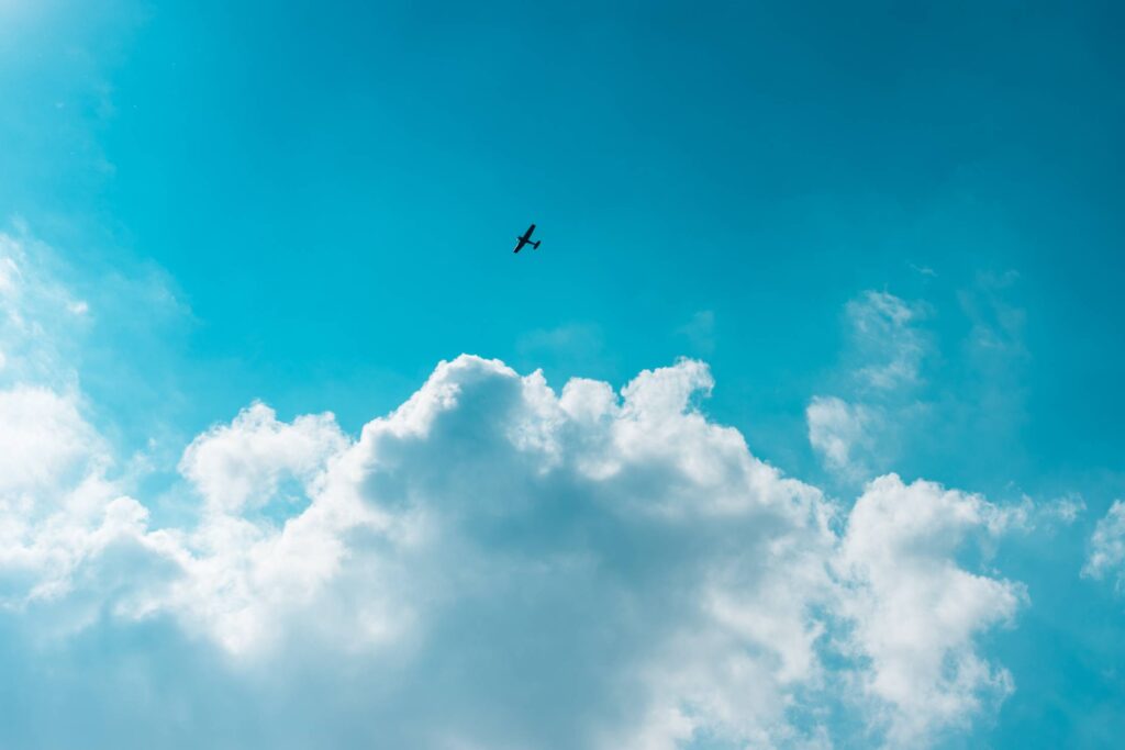 Little Plane Above The Clouds Free Photo