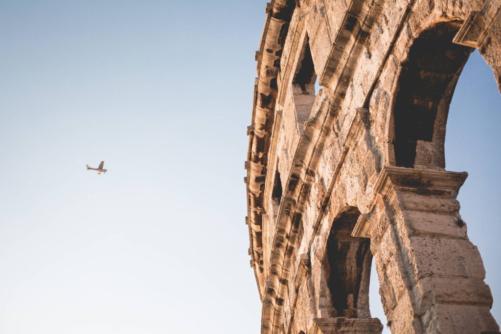 Little Plane and Roman Arena in Pula, Croatia Free Photo