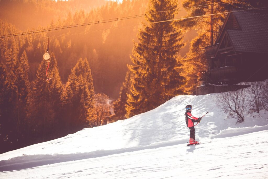 Little Skier On a Ski Lift Free Photo