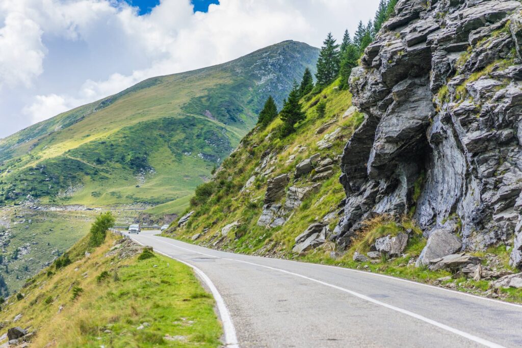 Long Road Along Romanian Mountains and Rocks Free Photo