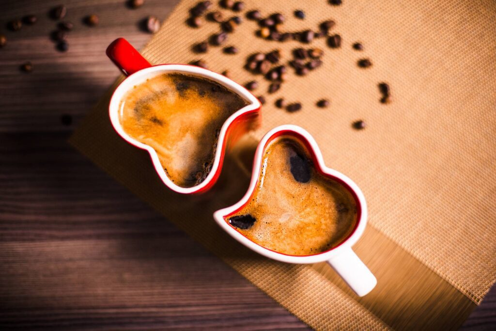 Lovely and Romantic Heart Coffee Cups Free Photo