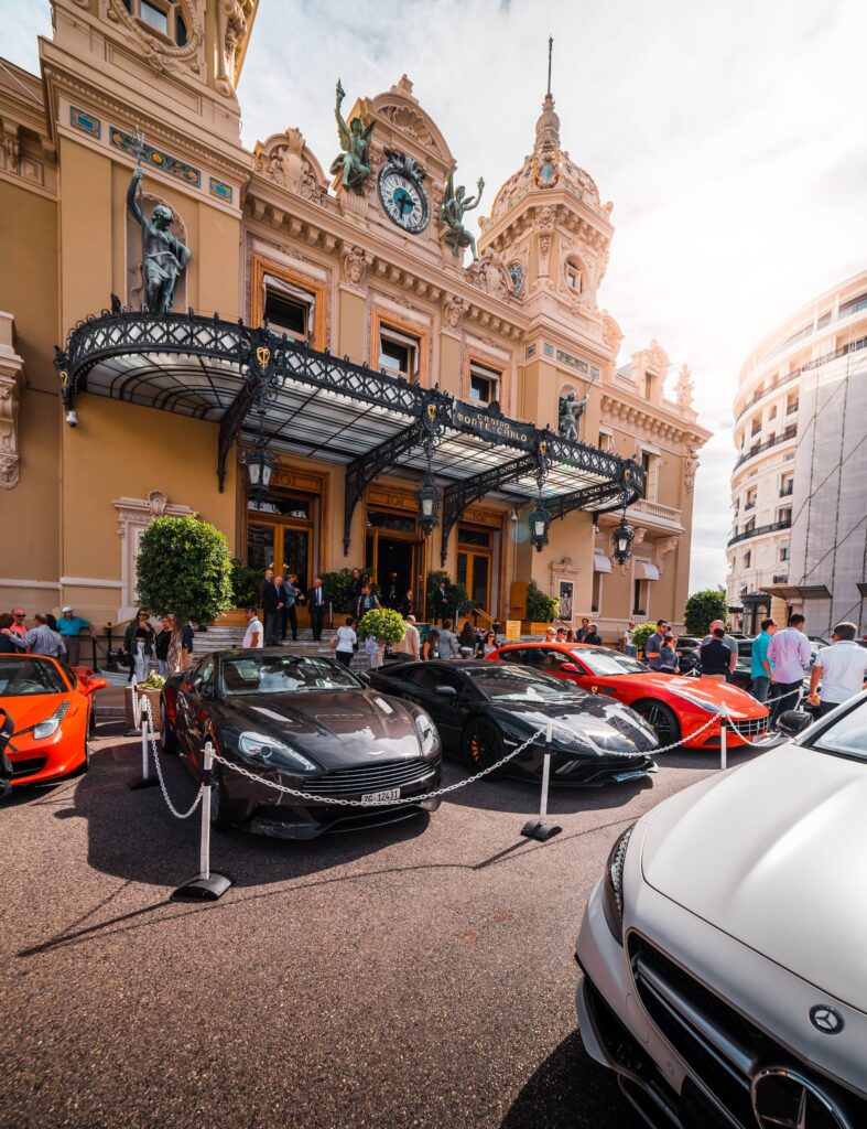 Luxury Cars and Tourists in front of Monaco Casino Free Photo