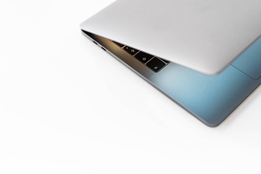 MacBook Laptop on White Background Free Photo