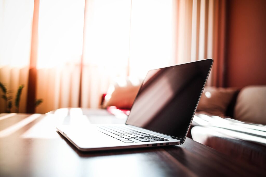 MacBook on Living Room Table Free Photo