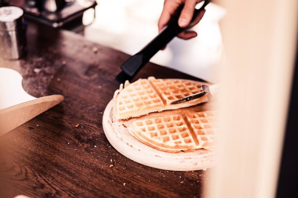 Making Waffles Cutting Them into Pieces Free Photo