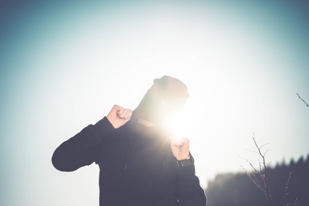 Man Hiding Himself Under His Beanie Cap Free Photo