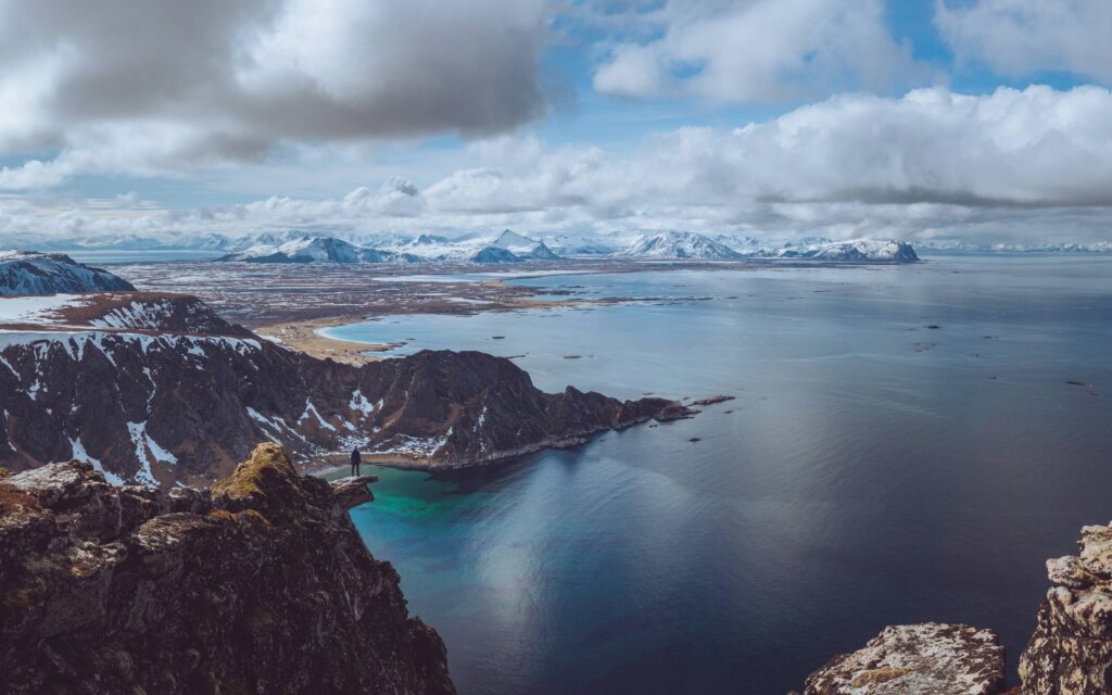 Man on the Edge of the Cliff in Norway Free Photo