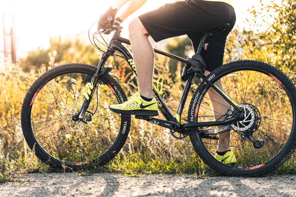 Man Sitting on a Mountain Bike Free Photo