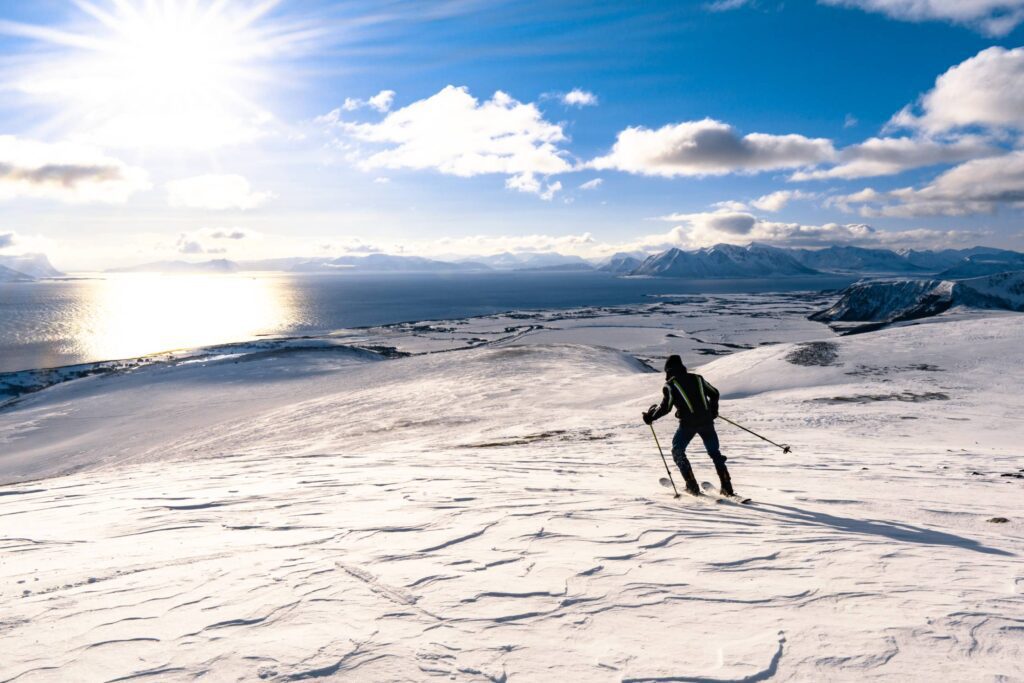 Man Skiing on Snowy Mountains of Norway Free Photo