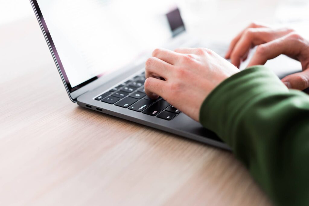 Man Working on His Laptop Computer Free Photo