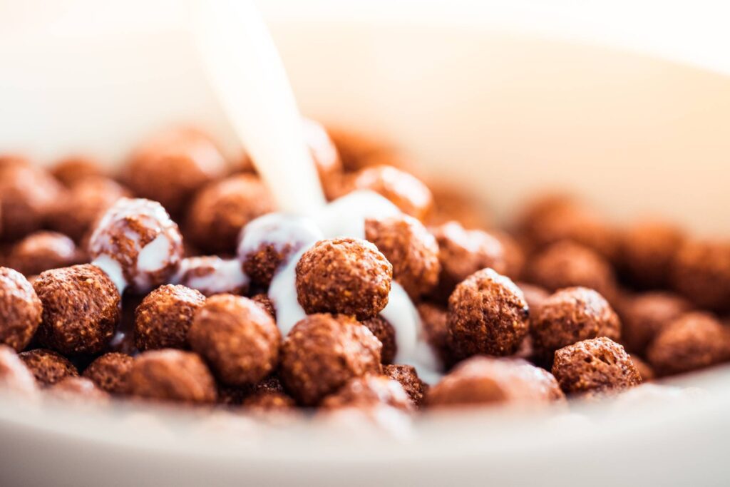 Milk Pouring on Cereal Chocolate Balls #2 Free Photo