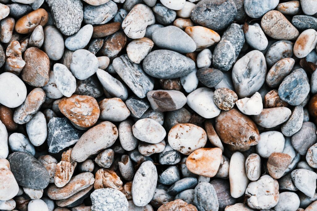 Mixture of Pebbles and Stones Pattern Free Photo