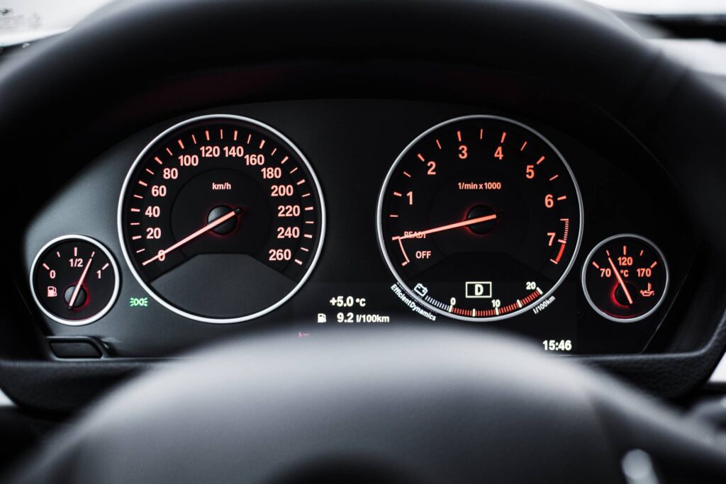 Modern Car Dashboard with Speedometer and Tachometer Free Photo