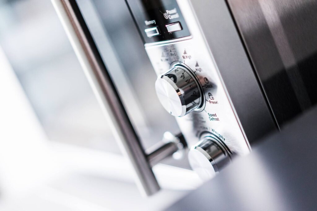 Modern Silver Microwave Controls Close Up Free Photo