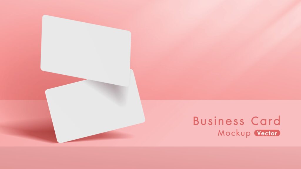 Modern white business cards mockup tamplate with pink background. Free Vector