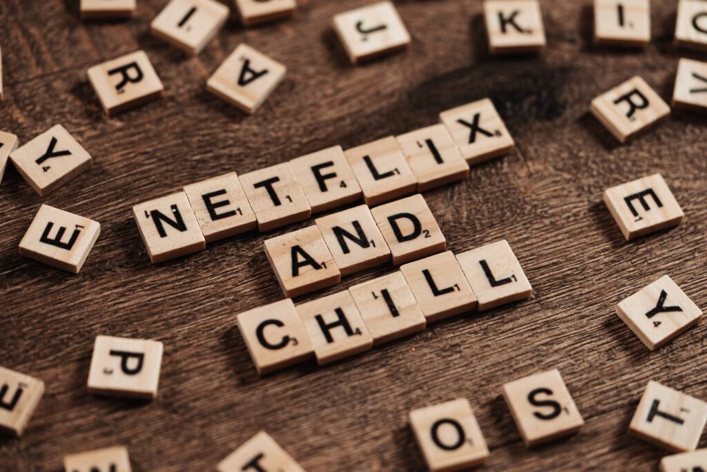 Netflix and Chill Written on The Scrabble Tiles Free Photo