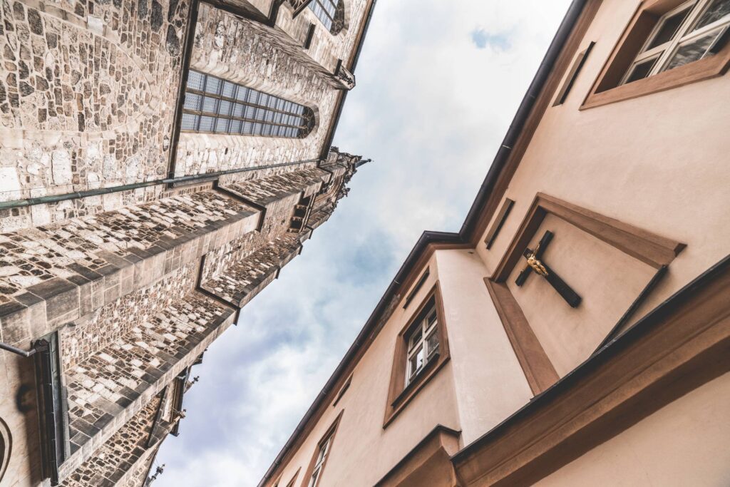 Old Church and Castle Against Cloudy Sky Free Photo