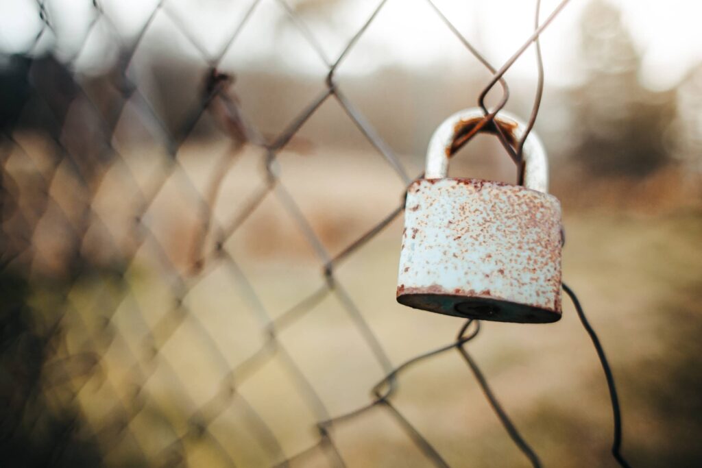 Old Lock on the Fence Free Photo