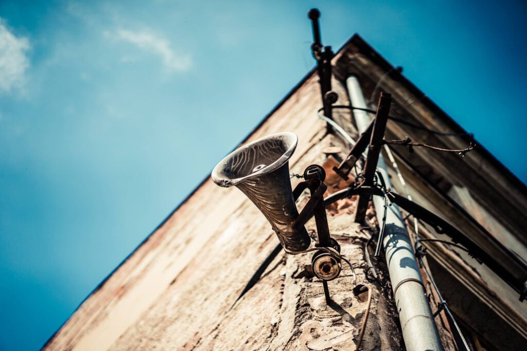 Old Loudspeaker Megaphone on Abandoned House Free Photo