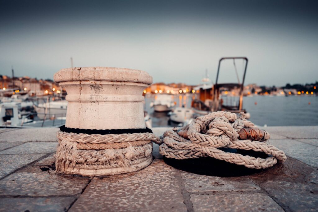 Old Marina Bollard with Ropes in Early Evening Free Photo