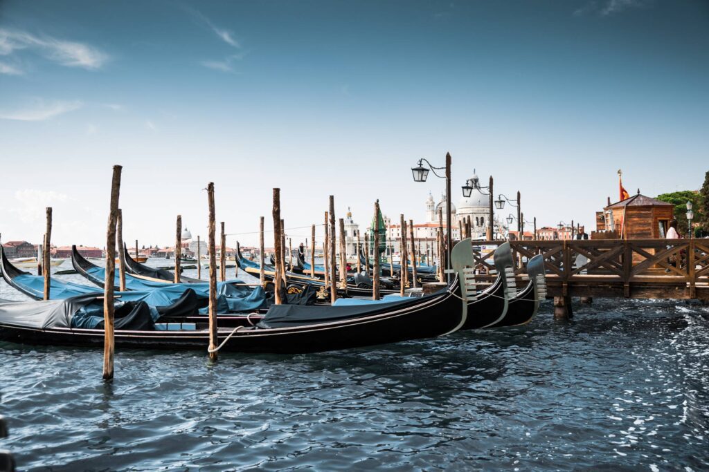 Old Pier with Gondolas in Venice Free Photo