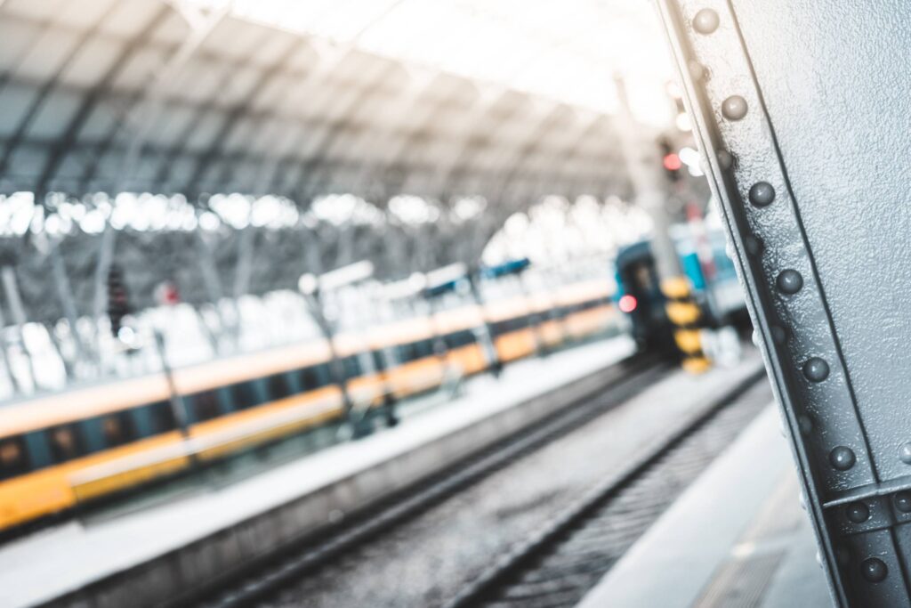 Old Steel Construction Railway Station Blurred Background Free Photo