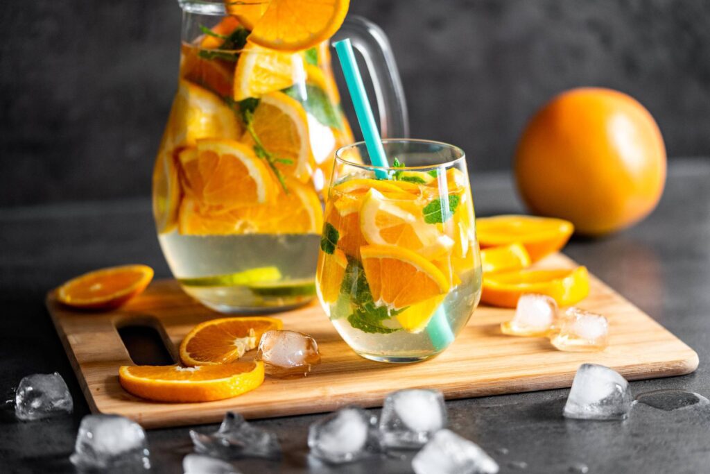 Orange Lemonade with Ice Cubes Free Photo