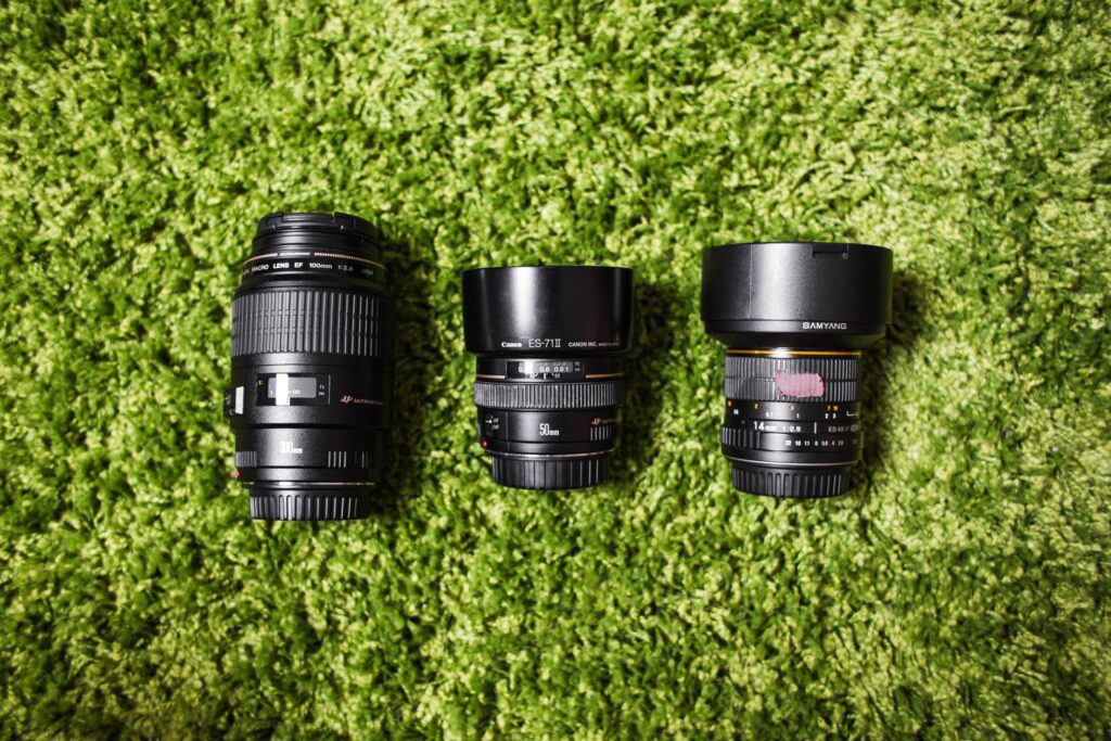 Photography Camera DSLR Lenses on Green Carpet Free Photo