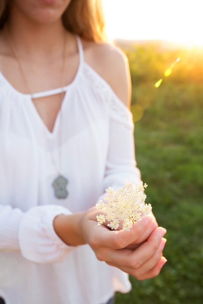 Woman Holding Flowers Free Stock HD Photo