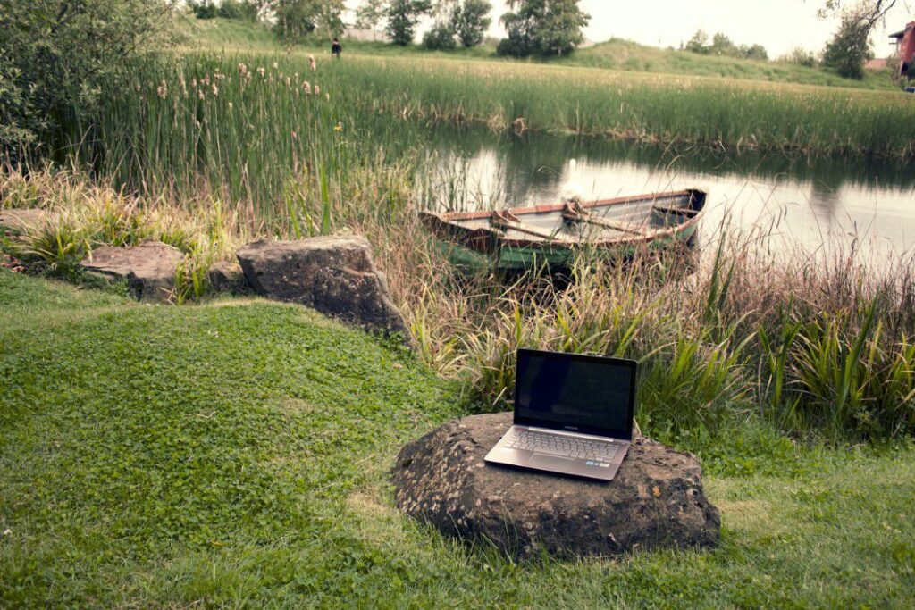 Laptop on Lake Free Stock HD Photo