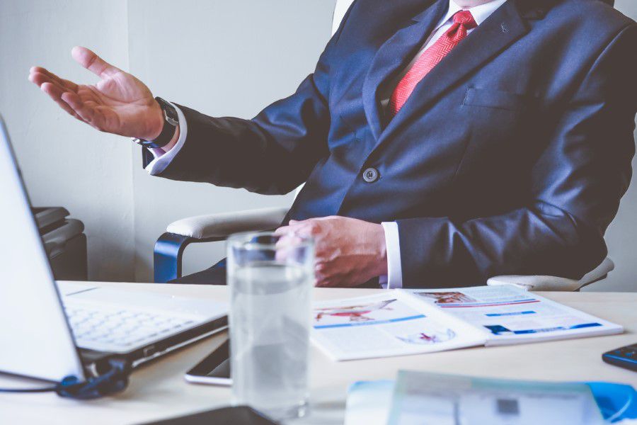 Talking at Desk Free Stock HD Photo