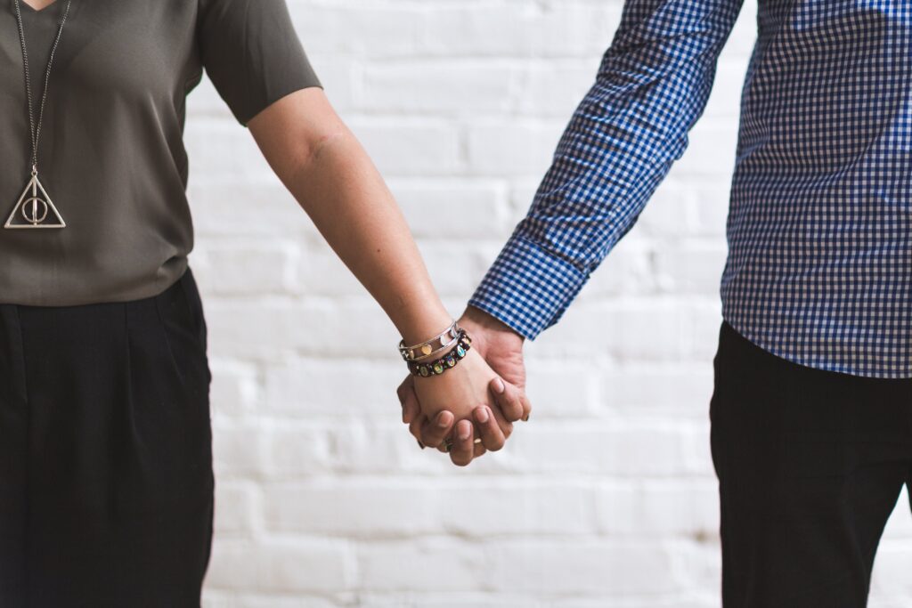 Couple Holding Hands Free Stock HD Photo