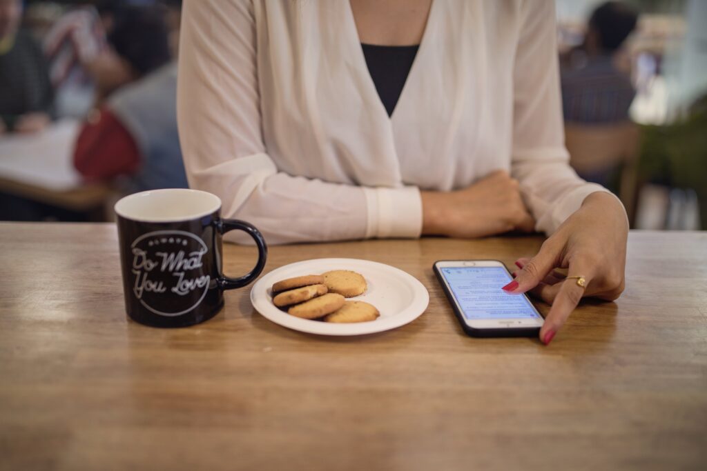 Woman Browsing Phone Free Stock HD Photo