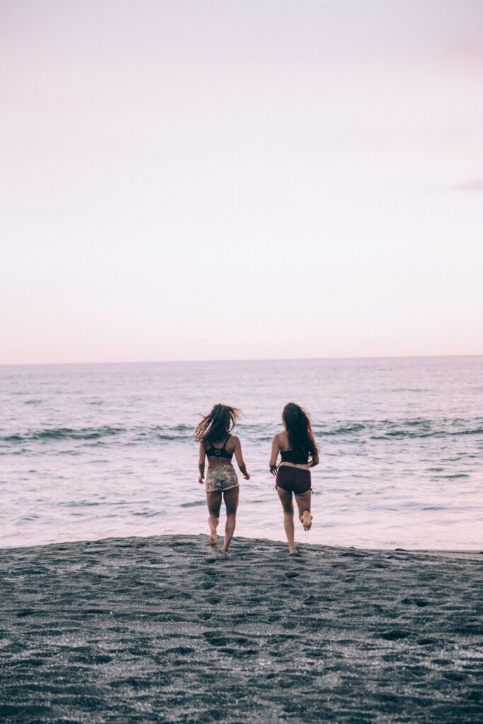 Women Beach Playing Free Stock HD Photo