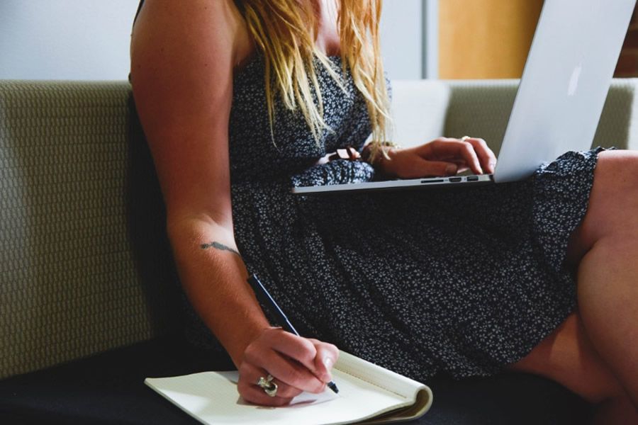 Woman Taking Notes Free Stock HD Photo