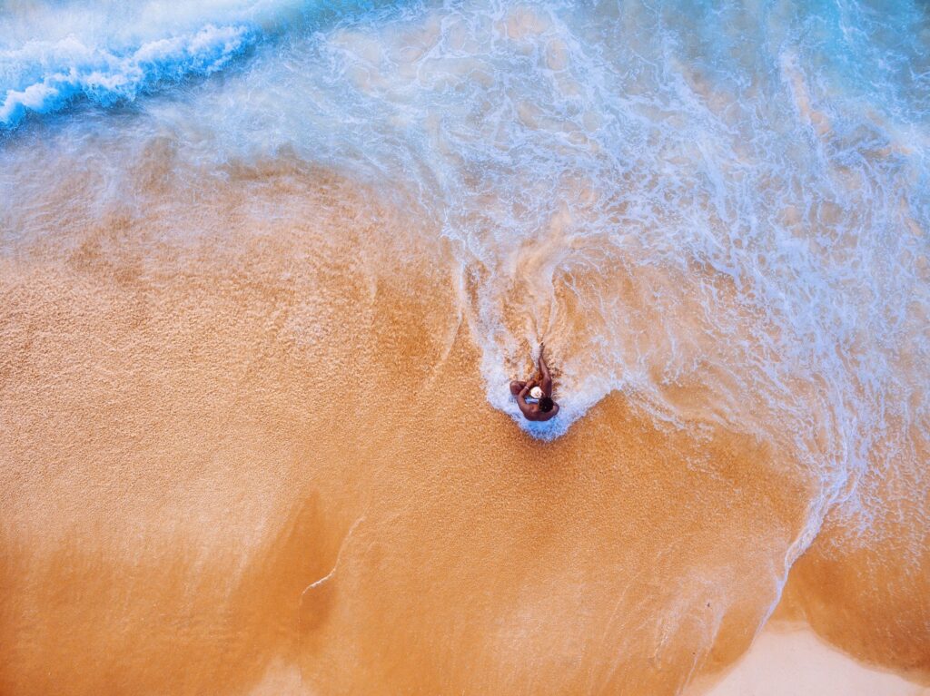 Man at Beach Aerial Free Stock HD Photo