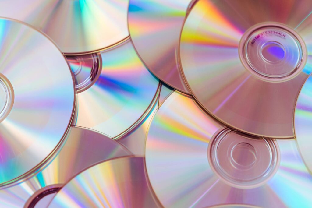 Pile of CDs Compact Discs and DVDs Free Photo