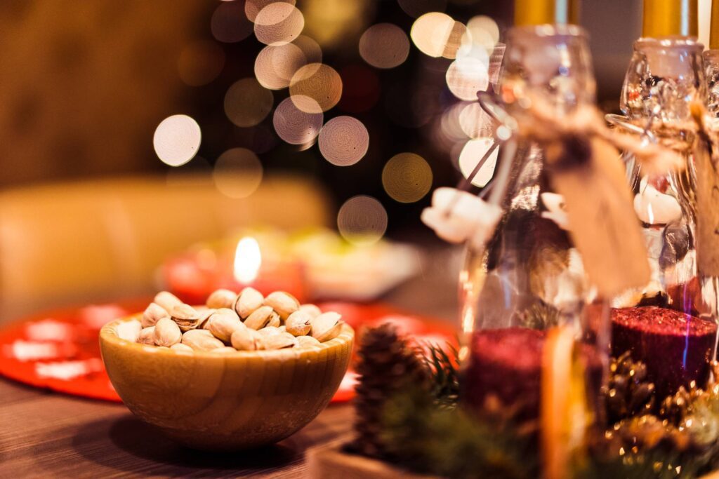 Pistachio Bowl on Christmas Table Free Photo