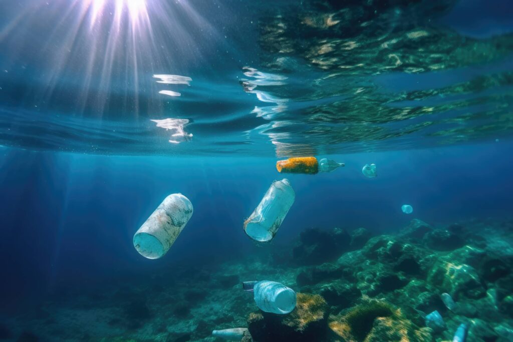 Plastic Bottles in Blue Sea Ecological Ocean Pollution Stock Free