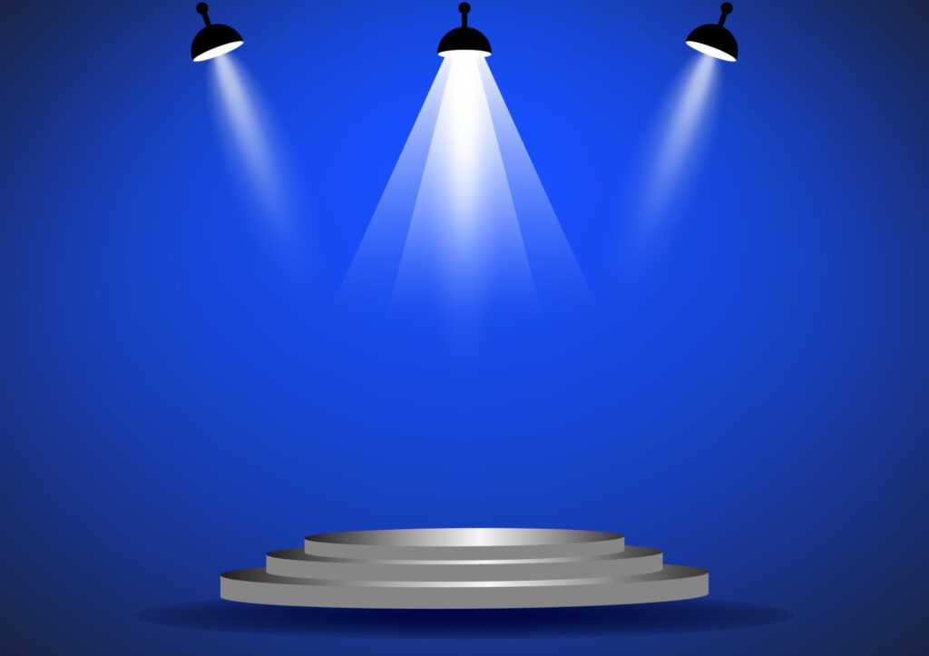 podium with spotlight for show with blue wall background Free Vector