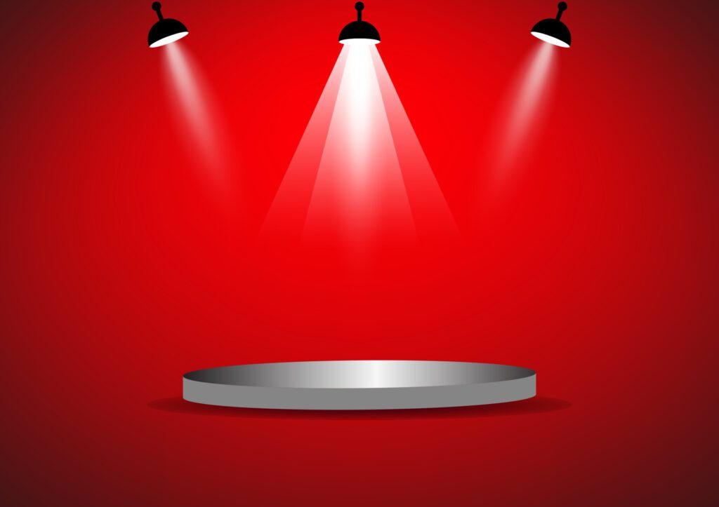 podium with spotlight for show with red wall background Free Vector