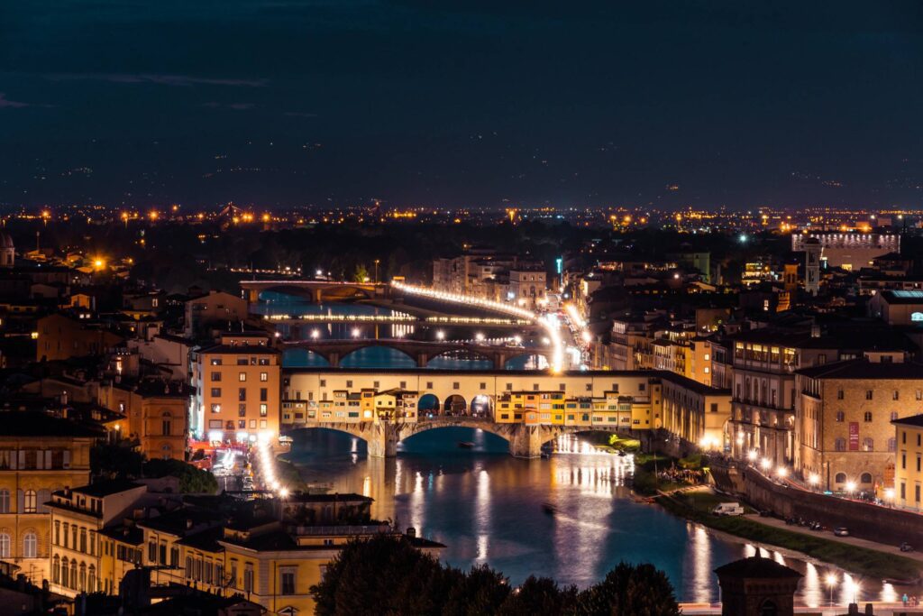 Ponte Vecchio on Arno River at Night Free Photo