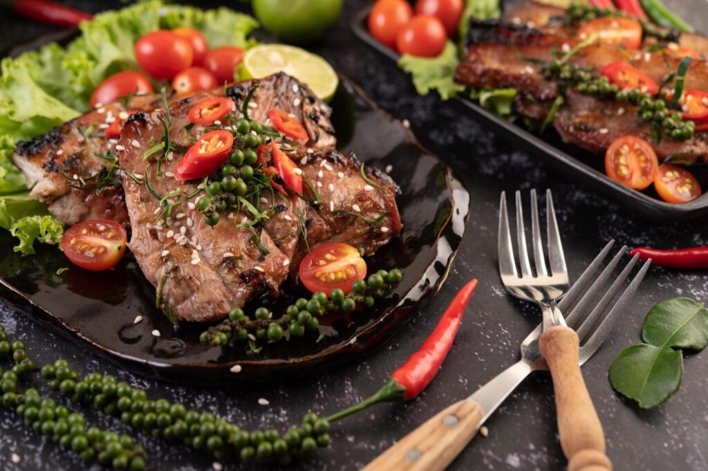 
									Pork steak topped with white sesame and fresh pepper seeds along. Stock Free