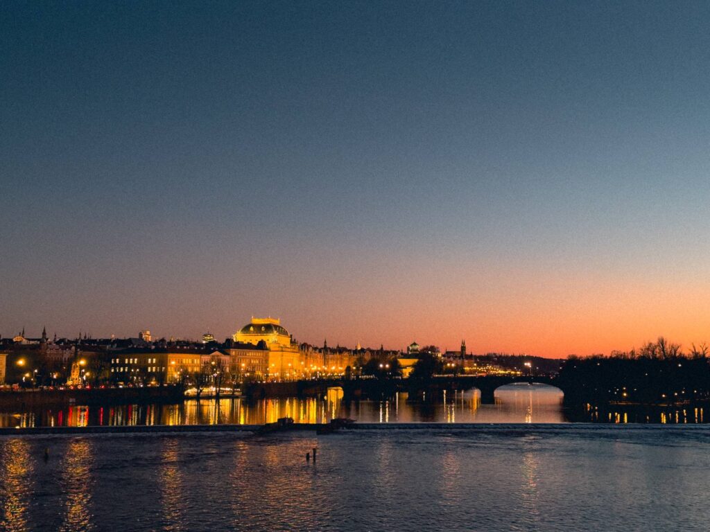 Prague National Theatre With Vltava River and Sky After Sunset Free Photo